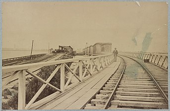 The old span (left) and the new (right) Long Bridge after rails were moved over in 1865 looking toward Washington, DC