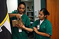 Student doing hands on training at a medical clinic.