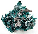 Dioptase with Cerussite, Christoff Mine, Kunene Region, Namibia. 6.9 × 5.7 × 4.8 cm