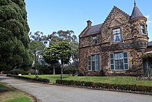 Overnewton Castle’s architecture is a unique blend of Scottish, Gothic, and Victorian styles, reflecting its 19th-century construction.