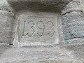 The erroneous date stone on the building's exterior