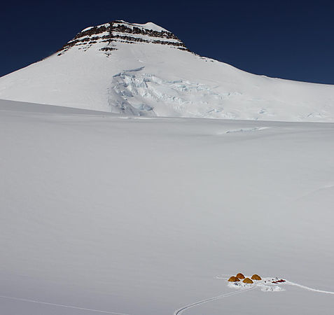 The summit of Gunnbjørn Fjeld is the highest point on the Island of Greenland, Kalaallit Nunaat, the Kingdom of Denmark, and the entire Arctic.