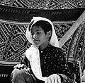 Boy in the tent of Sheikh Faisal ibn Jasi, Howeitat tribe, Jordan, 1968.