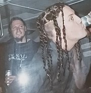 Danny Hamilton looking to Brian Welch drinking a beer