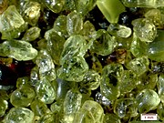 Olivine grains that eroded from lava on Papakolea Beach, Hawaii