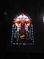 Stained glass window of Sacred Heart in Art Deco style