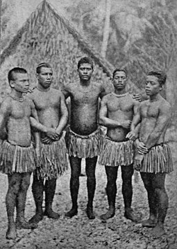 People of Nauru wearing traditional, short grass skirts called ridi, c. 1914