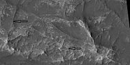 Close view of ridges, as seen by HiRISE under HiWish program. Arrows point to some straight ridges.