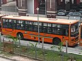 A bus of the "Yamuna Sarthi Bus Seva" at the Botanical Garden metro station