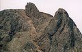 The 'Inaccessible Pinnacle', with climbers on the summit of Sgùrr Dearg.