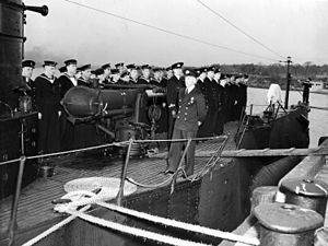 The ceremony to rename US S-class submarine as Polish submarine ORP Jastrząb. Lt.Cmdr. Boleslaw Romanowski waits for officials in front of the crew