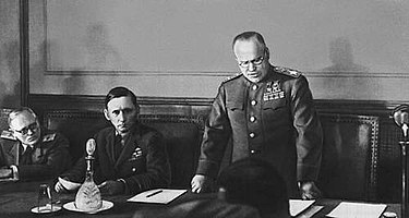Arthur Tedder (centre) at the ceremony of the German unconditional surrender (May 1945). Standing is Soviet Marshal Zhukov reading the act of the surrender.