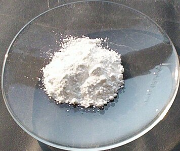 Zinc white is made from zinc oxide. Zinc oxide is used in paints, suntan lotion, and some foods.
