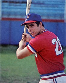 A baseball player in red