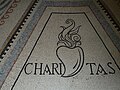 Mosaïque représentant le symbole de la charité (Cœur ardent)