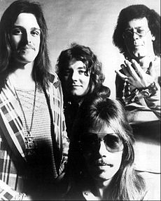 The band in 1974; left to right: Pete Haycock, Derek Holt (top), Colin Cooper (bottom), John Cuffley