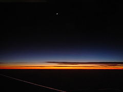 Astronomical twilight as seen from a plane window