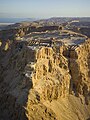 Image 17An aerial view of Masada in the Judaean Desert, with the Dead Sea and Jordan in the distance