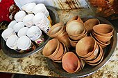 Old kulhar and new paper cups at a "tea stand" in Kolkata, India in 2015