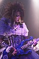 Moi dix Mois guitarist Mana performing in 2011