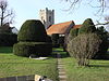 Topiary walk up to the porch of Borley Church