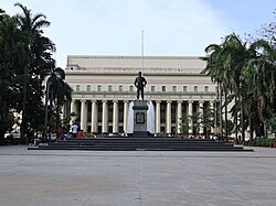 Liwasang Bonifacio and the Manila Central Post Office. The center of the plaza is dominated by a bronze statue of Andrés Bonifacio