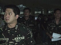 LTC HERBERT M BAUTISTA MNSA (GSC) RES PA together with LTC SAL G DUMABOK MNSA (RES) GSC PA, and then TSg Virgilio S Ferrer II (Res) PA inspect the troops prior to deployment for Rehabilitation Operations on areas affected by TS Ketsana.