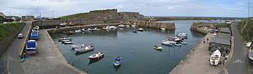 The inner harbour, breakwater designed by James Walker in the background