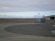 A boat that appears to have landed on the runway.