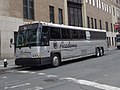 An NJT-owned, Academy-operated 2017-model MCI D4500CT Commuter Coach in Lower Manhattan