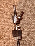 Tama hi-hat clutch of the traditional pattern