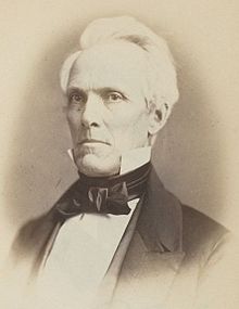 1859 sepia tone head and chest photo of Nehemiah Abbott, facing left, looking slightly left