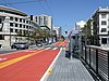 A bus stop in the median of an urban arterial