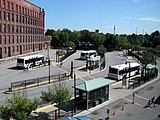 Three LRTA buses stopped at the Robert B. Kennedy Bus Terminal