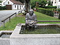 La fontana Klosterbrunnen di Welfenstraße, viuzza all'interno del paese di Steingaden