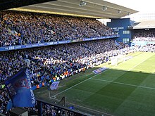 Fans in the Sir Bobby Robson Stand on the day Ipswich Town won promotion to the Championship, 29th April 2023