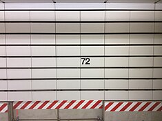 The trackside tiles at the 72nd Street station