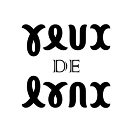 L'expression « yeux de lynx », ambigramme calligraphié par symétrie miroir d'axe horizontal.