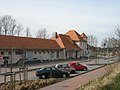 Bahnhof mit Bedürfnisanstalt und Güterabfertigungsgebäude