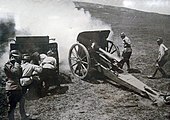 A 10.5 cm Feldhaubitze M.12 with a box trail carriage. Below the breech is an open space to increase elevation.