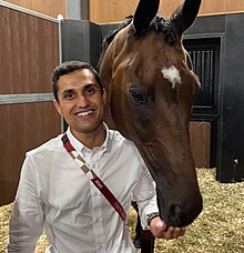 Portrait of Fouaad Mirza with his horse