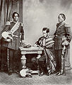 Image 17Malagasy Embassy to Europe in 1863. Left to right: Rainifiringa Ralaimaholy, Rev. John Duffus and Rasatranabo aka Rainandrianandraina. (from History of Madagascar)