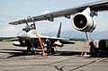 MiG-29 with drop tanks receiving fuel transferred from an Il-76 tanker