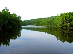 A photo of Spring Lake in Ozark Acres, Arkansas. Spring Lake is one of two lakes in the area.
