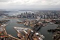 Aerial view of Sydney Harbour from the west in 2008. Anzac Bridge is visible at lower centre right, while the disused (second) Glebe Island Bridge is visible immediately to its left.