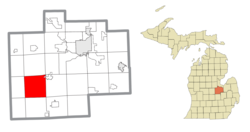 Location within Saginaw County (red) and an administered portion of the village of St. Charles (pink)