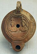 Star crosses indicate the constellation Gemini on this Roman oil lamp (1st century CE)