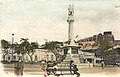 View of the square in a postcard dated approx. from 1900-1915.