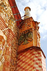 Habsburg double headed eagle on the facade of the Concá mission