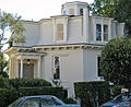 A similar arrangement of masonry ground floor and timber frame second floor, but built in a decorative style typical of San Francisco. Feusier Octagon House, San Francisco, California (built 1857).